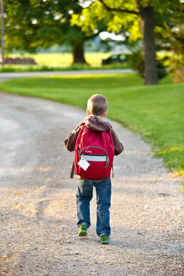 Child wearing a backpack