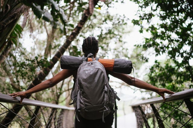 Hiker on a bridge